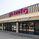 A Glo Tanning storefront in Norman West.